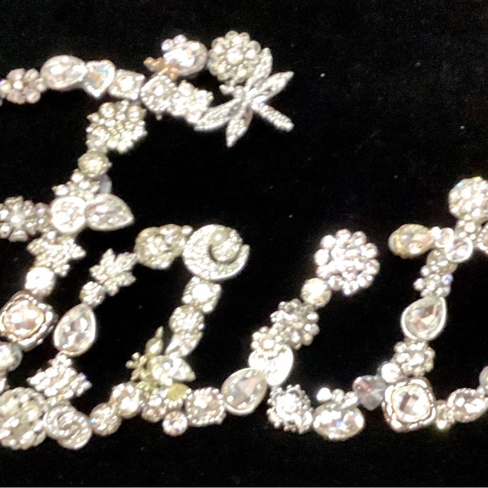 Faith in refurbished jewelry, on metal base for wall hanging 12” long x 7” high